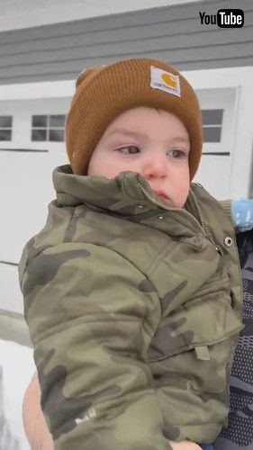 「Baby Isn't Too Sure About The Snow || ViralHog」