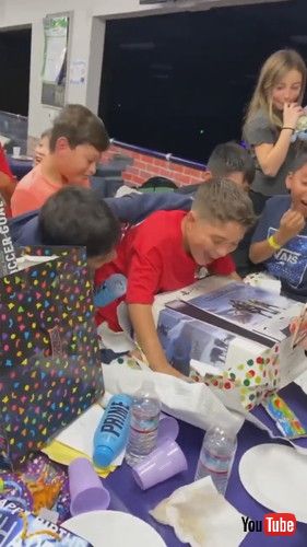 「Boy and His Friends Get Excited Over Him Getting Gaming Console for Birthday Gift - 1390033」