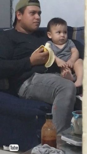 「Baby Attempts to Surreptitiously Eat His Dad's Banana || ViralHog」
