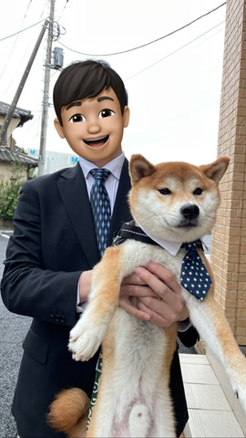 飼い主さんとおそろいのネクタイつけてるワンコ