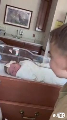 「Toddler Brother Meets His Newborn Sister For First Time - 1412333」