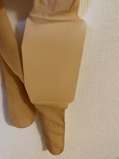 タイツの中の紙