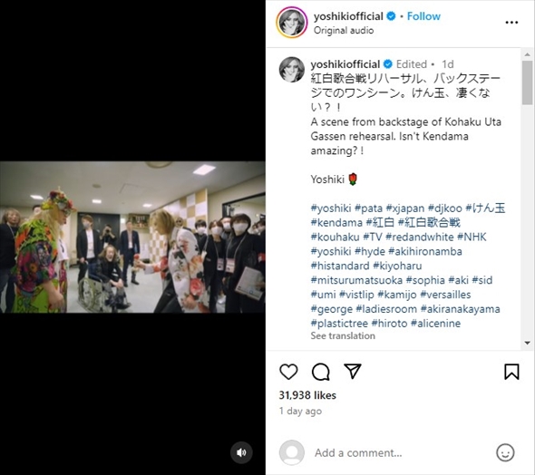 車イスに乗るX JAPANのPATA