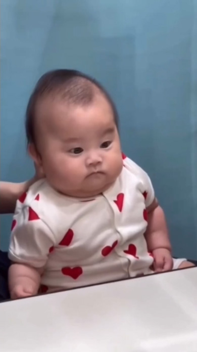 撮影される赤ちゃん