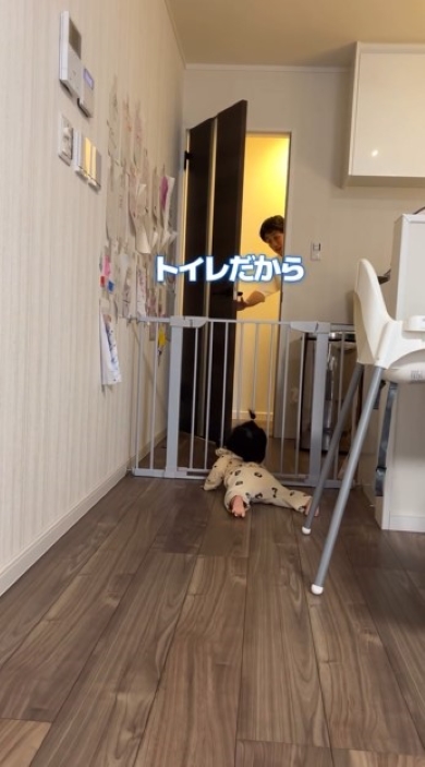 トイレに行こうとする父親