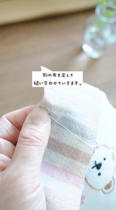 手縫いをする画像