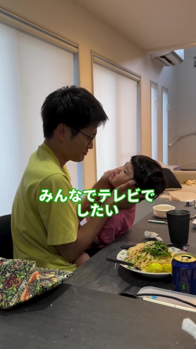 話をするパパ
