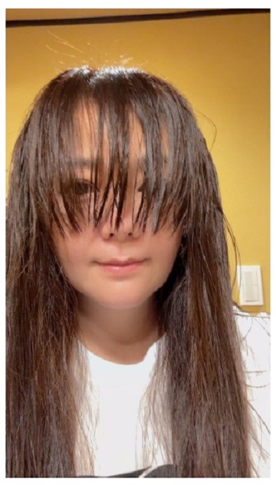 髪が顔半分覆いつくした華原朋美