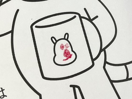 ぬり絵に描いた顔がかわいい