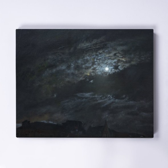 光を発しているような月の絵