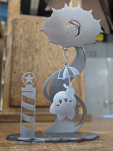 上にクラッコもいる星のカービィのパラソルワドルディのスタンド