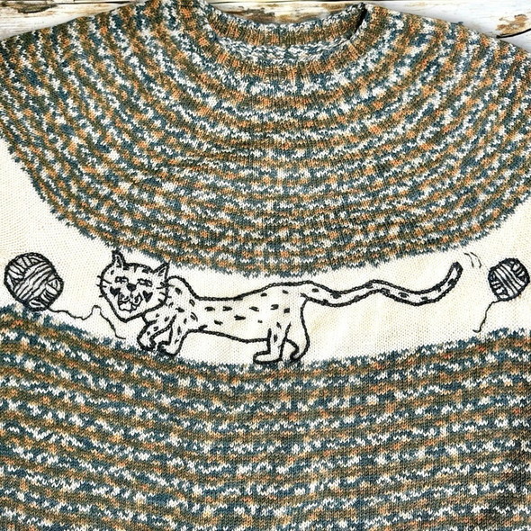 レオパード柄の手編みのセーター