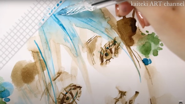 画家がラメインクで宝石を描く