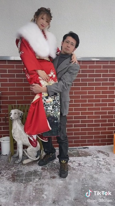 成人式の女性と父