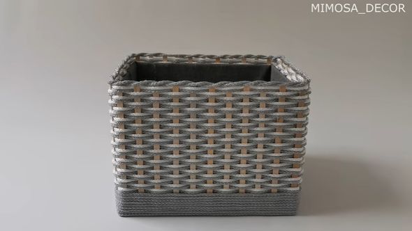 コットン生地やひもで飾り付けられた整理箱