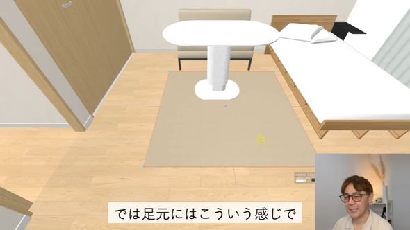 明るい茶色のソファとラグ、白いテーブルを配置