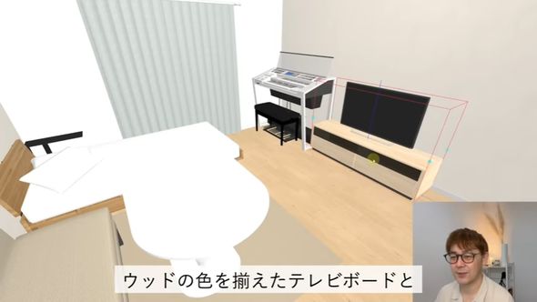 向かいの壁にはキーボードとテレビを配置